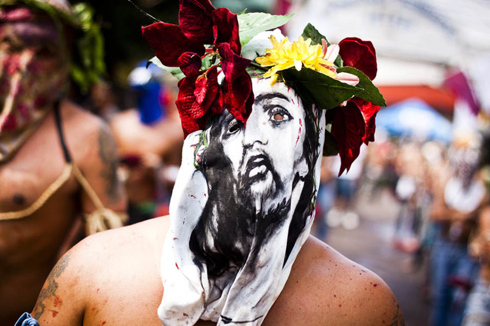 Man wearing Jesus mask