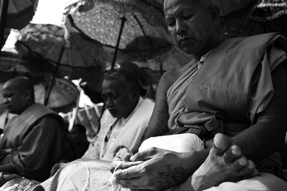 Monks praying at the end of the festival