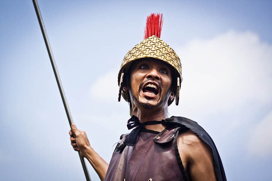 A celebrant dressed as a Roman centurion in Angeles, The Philippines.