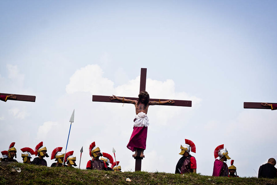 Jesus on the cross with Roman centurions