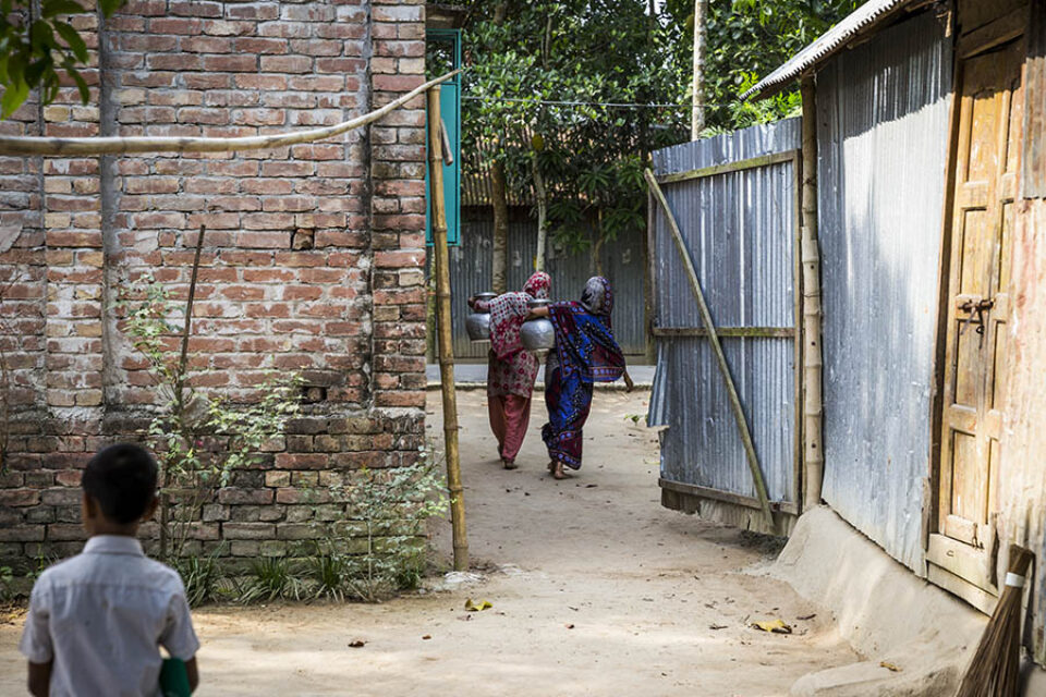 Women go to fetch drinking water