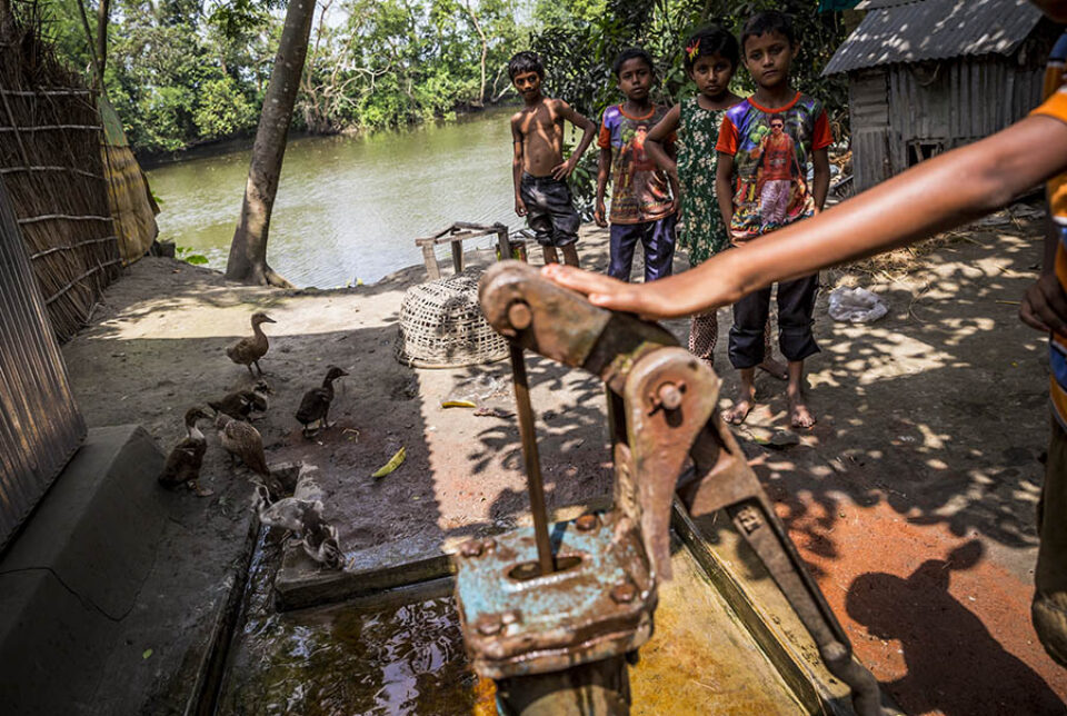 Children by a village tubewell