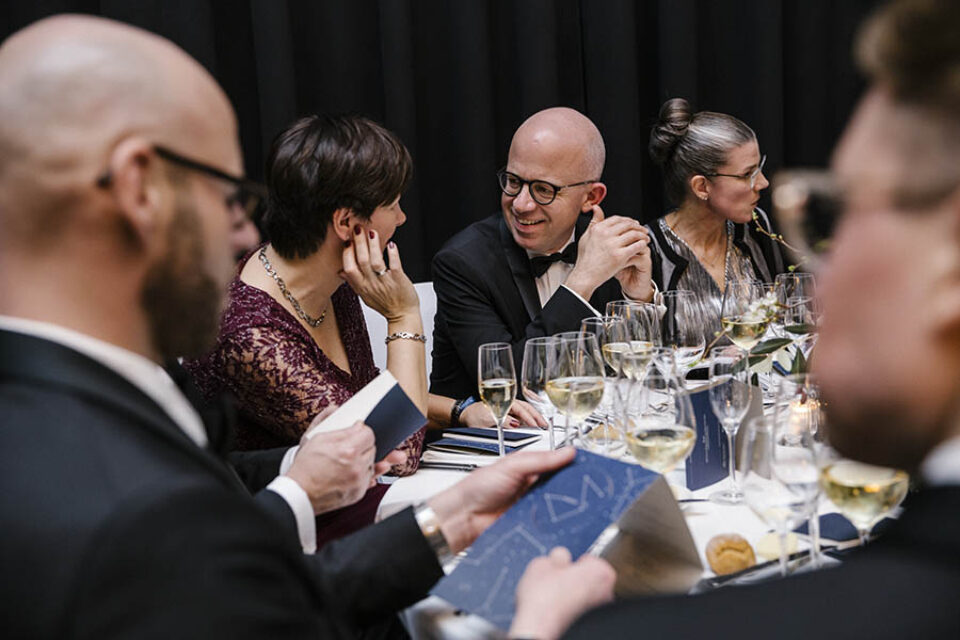 Guests speak at gala dinner