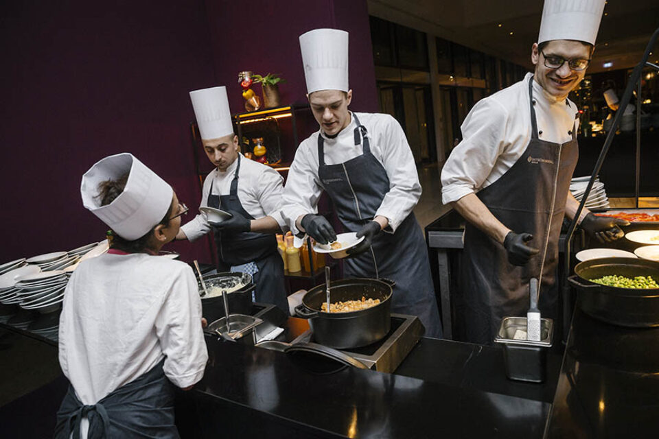 Chefs plating food