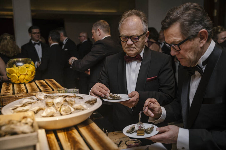 Event guests at oyster bar