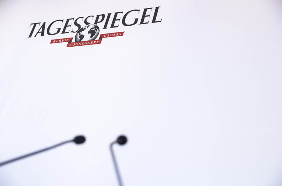 Lectern microphones and Tagesspiegel logo