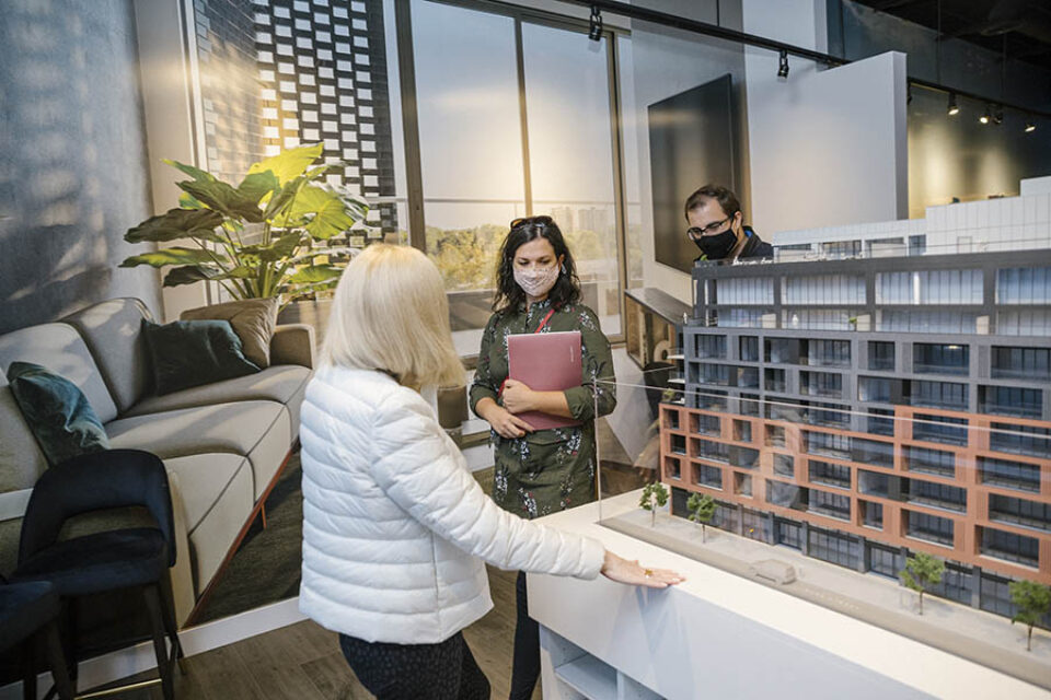 Clients look at scale model, Ottawa