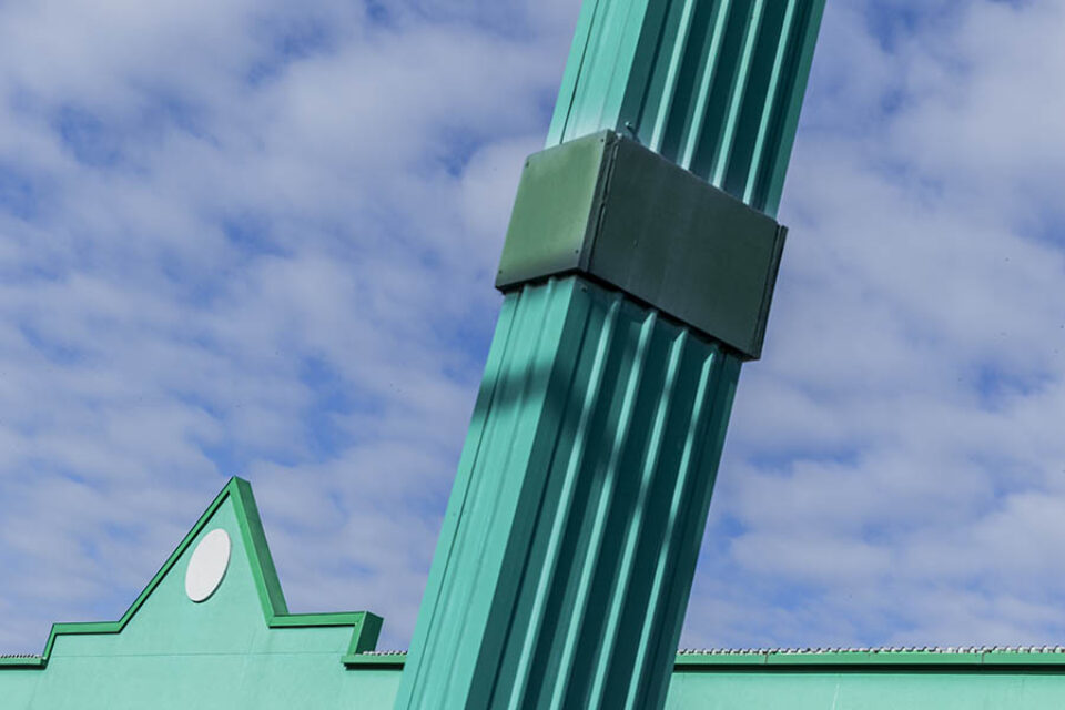 Colourful post and facade composition