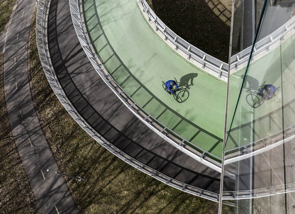 Cyclist using Passerelle Normandie, Longueuil