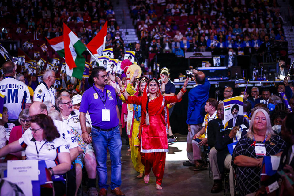 Members of Indian delegation dancing at convention in Bell Centre