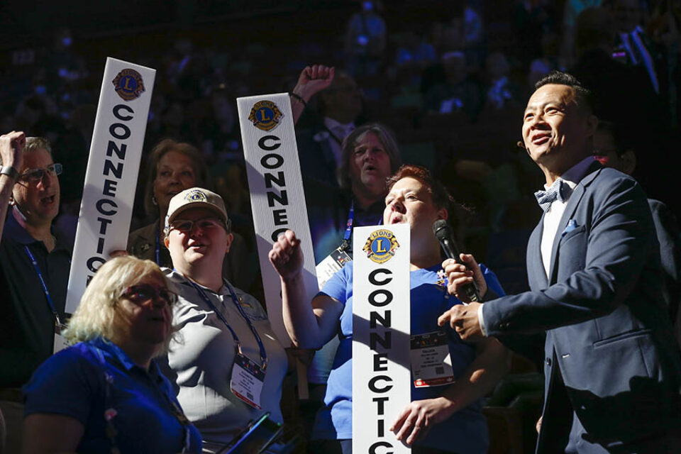 Presenter with convention delegates