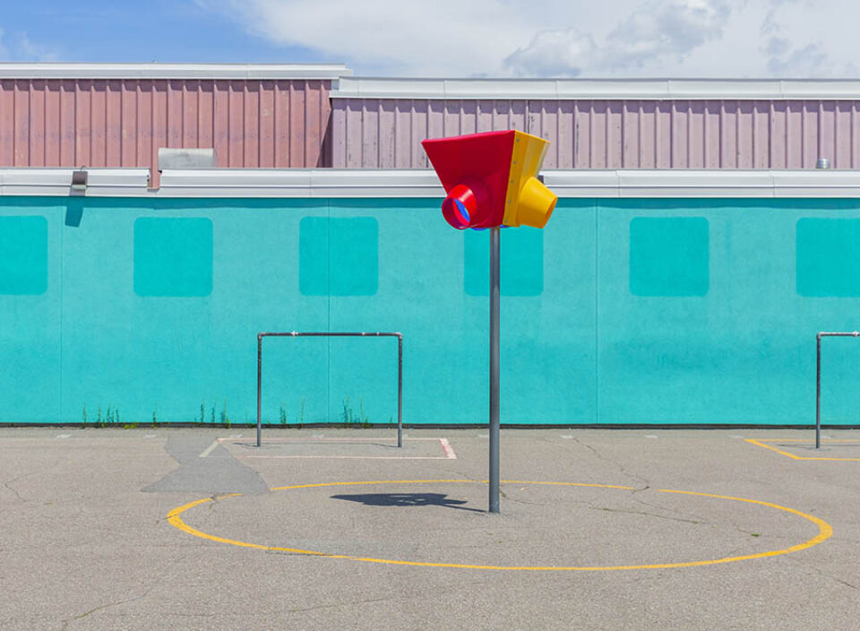 Goalposts and basketball net in playground