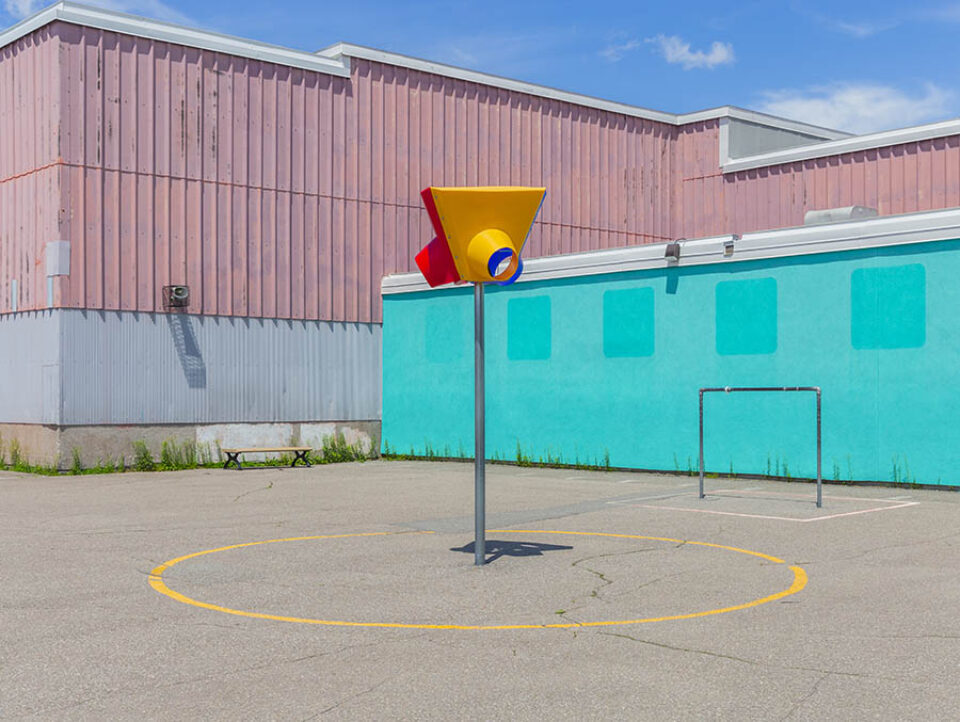 Goalposts and basketball net in playground