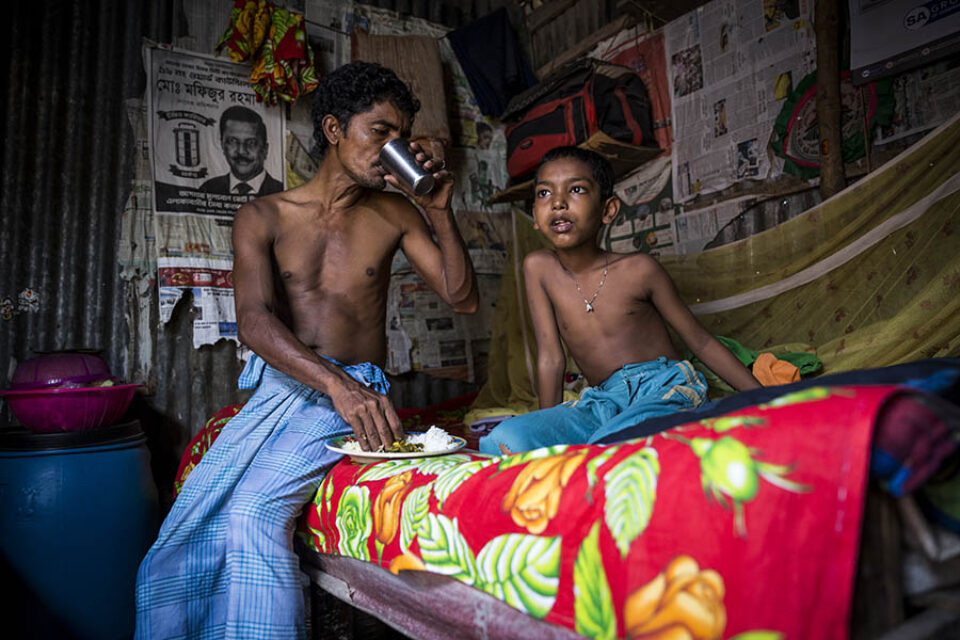 Father and son in Korail Slum