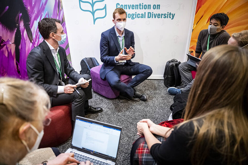 Delegates in discussion at COP15 Montreal