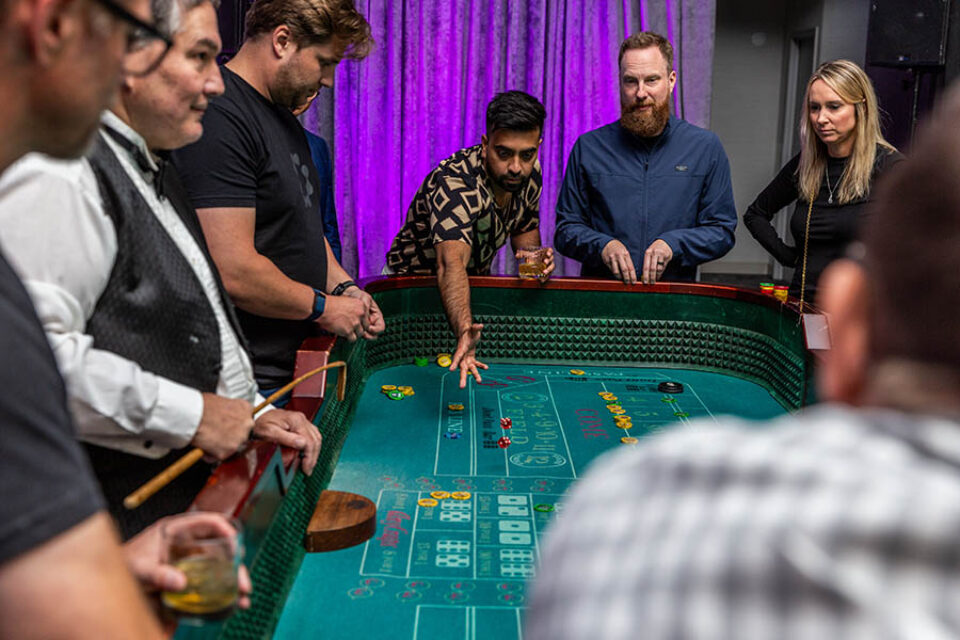 Montreal event photographer - delegates play craps