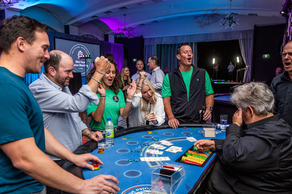 Attendees enjoy blackjack at an event