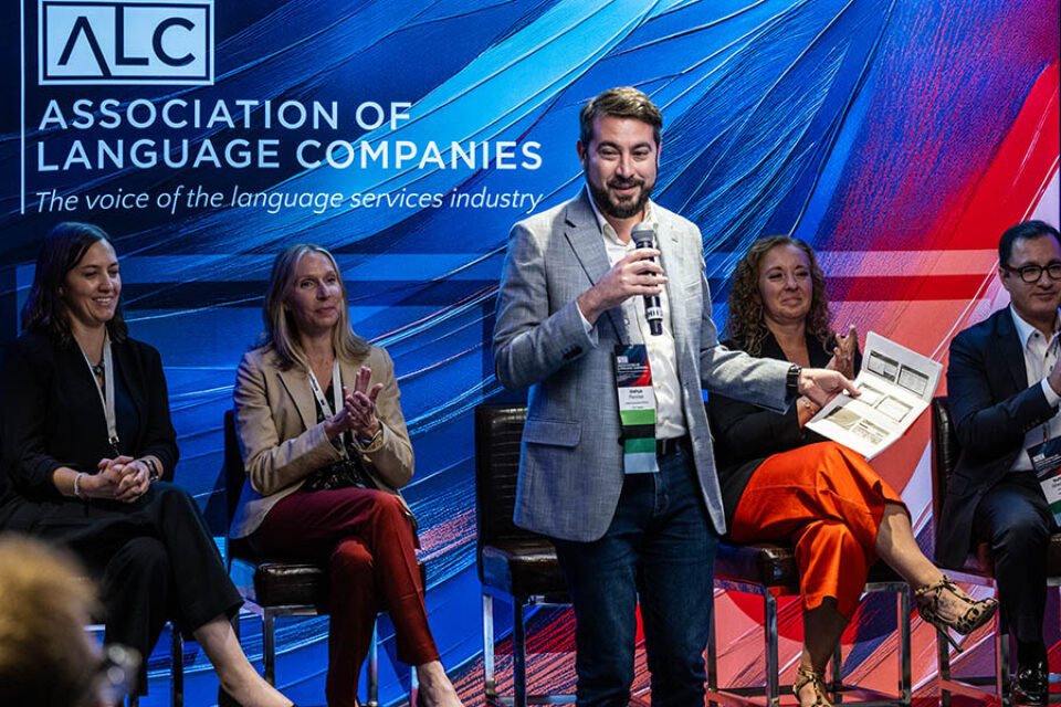 Man talking on event stage