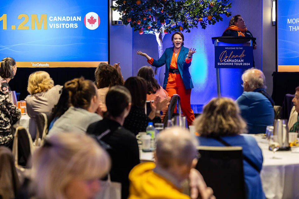 Event presenter onstage - Montreal event photography